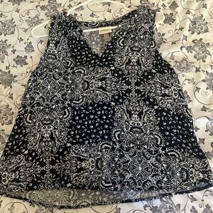 Sleeveless blue and white top